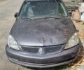 Сірий Міцубісі Lancer, об'ємом двигуна 1.6 л та пробігом 105 тис. км за 2200 $, фото 1 на Automoto.ua