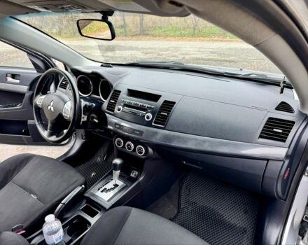 Серый Мицубиси Лансер, объемом двигателя 2 л и пробегом 225 тыс. км за 6890 $, фото 16 на Automoto.ua