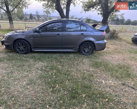 Серый Мицубиси Лансер, объемом двигателя 1.5 л и пробегом 255 тыс. км за 6000 $, фото 8 на Automoto.ua