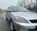 Сірий Міцубісі Lancer, об'ємом двигуна 1.6 л та пробігом 222 тис. км за 4300 $, фото 1 на Automoto.ua