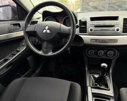 Сірий Міцубісі Lancer, об'ємом двигуна 1.5 л та пробігом 233 тис. км за 5890 $, фото 13 на Automoto.ua
