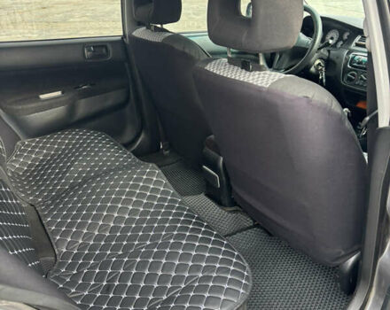 Серый Мицубиси Лансер, объемом двигателя 1.6 л и пробегом 222 тыс. км за 5200 $, фото 15 на Automoto.ua