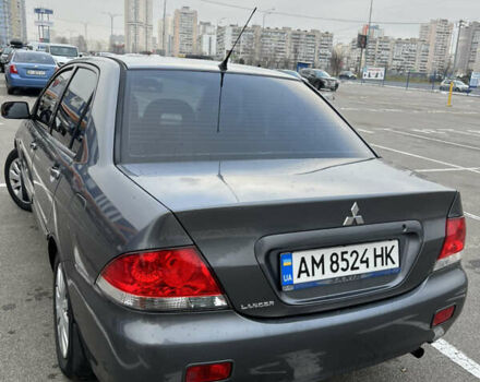 Серый Мицубиси Лансер, объемом двигателя 1.58 л и пробегом 183 тыс. км за 3800 $, фото 8 на Automoto.ua