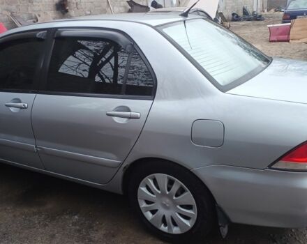 Сірий Міцубісі Lancer, об'ємом двигуна 1.6 л та пробігом 320 тис. км за 4167 $, фото 4 на Automoto.ua