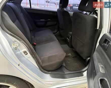 Сірий Міцубісі Lancer, об'ємом двигуна 1.6 л та пробігом 206 тис. км за 4799 $, фото 23 на Automoto.ua