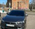 Серый Мицубиси Лансер, объемом двигателя 2 л и пробегом 247 тыс. км за 7350 $, фото 1 на Automoto.ua