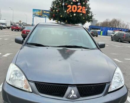 Серый Мицубиси Лансер, объемом двигателя 1.58 л и пробегом 183 тыс. км за 3800 $, фото 3 на Automoto.ua