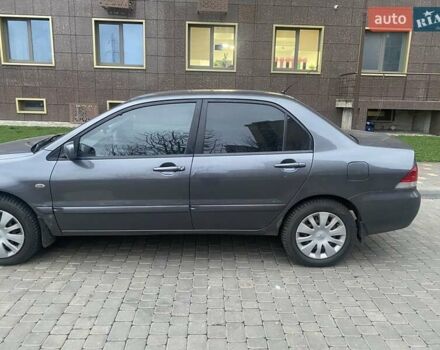 Сірий Міцубісі Lancer, об'ємом двигуна 1.6 л та пробігом 250 тис. км за 3500 $, фото 2 на Automoto.ua