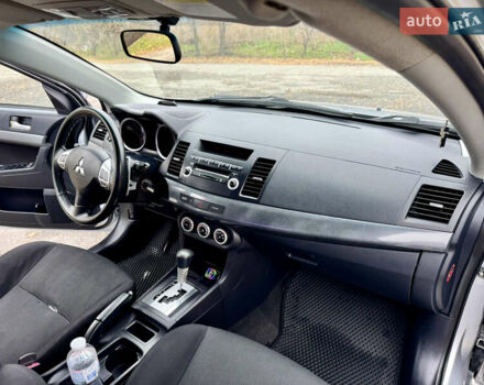 Сірий Міцубісі Lancer, об'ємом двигуна 2 л та пробігом 225 тис. км за 6890 $, фото 16 на Automoto.ua
