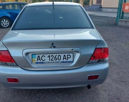 Серый Мицубиси Лансер, объемом двигателя 1.6 л и пробегом 117 тыс. км за 3980 $, фото 6 на Automoto.ua