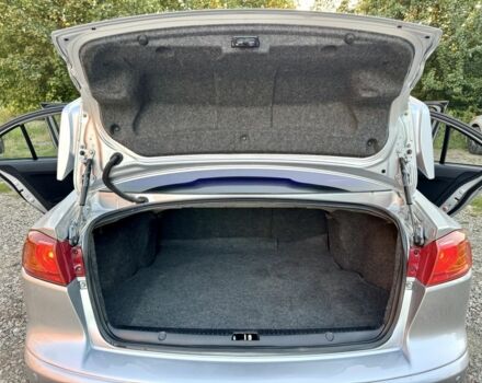 Серый Мицубиси Лансер, объемом двигателя 2 л и пробегом 223 тыс. км за 6890 $, фото 20 на Automoto.ua