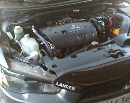 Серый Мицубиси Лансер, объемом двигателя 2 л и пробегом 77 тыс. км за 9800 $, фото 5 на Automoto.ua