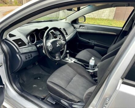 Серый Мицубиси Лансер, объемом двигателя 2 л и пробегом 225 тыс. км за 6890 $, фото 8 на Automoto.ua