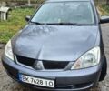 Сірий Міцубісі Lancer, об'ємом двигуна 1.6 л та пробігом 230 тис. км за 4400 $, фото 2 на Automoto.ua