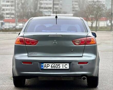 Серый Мицубиси Лансер, объемом двигателя 2 л и пробегом 203 тыс. км за 4999 $, фото 6 на Automoto.ua