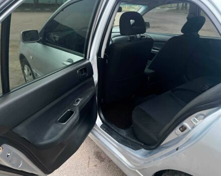 Сірий Міцубісі Lancer, об'ємом двигуна 1.6 л та пробігом 254 тис. км за 3800 $, фото 12 на Automoto.ua