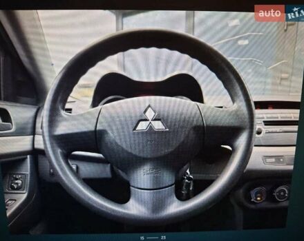 Сірий Міцубісі Lancer, об'ємом двигуна 1.5 л та пробігом 235 тис. км за 6500 $, фото 15 на Automoto.ua