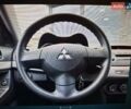 Сірий Міцубісі Lancer, об'ємом двигуна 1.5 л та пробігом 235 тис. км за 6500 $, фото 15 на Automoto.ua