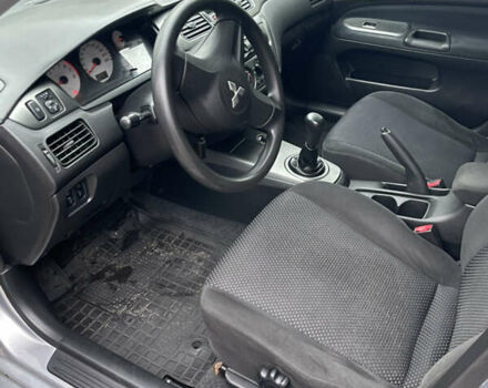 Сірий Міцубісі Lancer, об'ємом двигуна 1.59 л та пробігом 219 тис. км за 4500 $, фото 12 на Automoto.ua