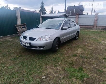 Сірий Міцубісі Lancer, об'ємом двигуна 1.6 л та пробігом 129 тис. км за 6000 $, фото 1 на Automoto.ua