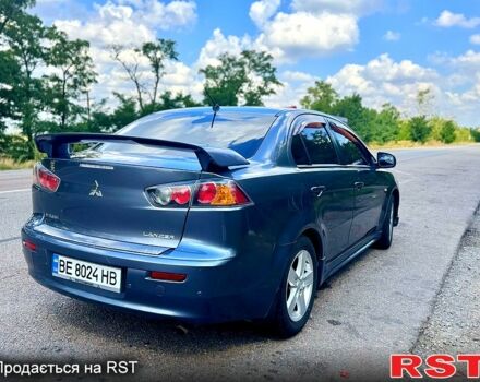 Серый Мицубиси Лансер, объемом двигателя 2 л и пробегом 250 тыс. км за 5800 $, фото 2 на Automoto.ua