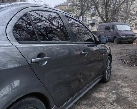Сірий Міцубісі Lancer, об'ємом двигуна 2 л та пробігом 186 тис. км за 6000 $, фото 11 на Automoto.ua