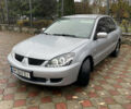 Сірий Міцубісі Lancer, об'ємом двигуна 1.59 л та пробігом 219 тис. км за 4500 $, фото 2 на Automoto.ua
