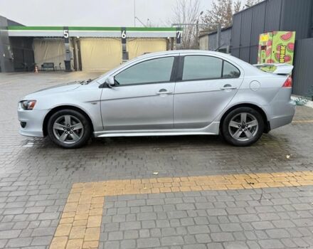 Серый Мицубиси Лансер, объемом двигателя 2 л и пробегом 210 тыс. км за 6500 $, фото 2 на Automoto.ua