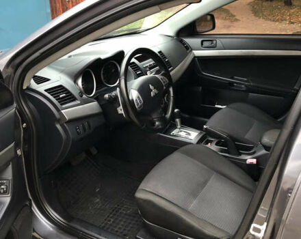 Сірий Міцубісі Lancer, об'ємом двигуна 2 л та пробігом 187 тис. км за 8000 $, фото 22 на Automoto.ua