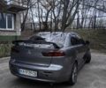 Сірий Міцубісі Lancer, об'ємом двигуна 2 л та пробігом 186 тис. км за 6000 $, фото 5 на Automoto.ua
