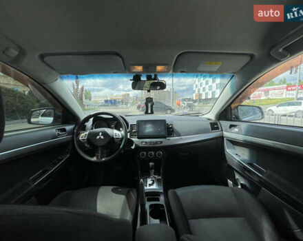 Серый Мицубиси Лансер, объемом двигателя 2 л и пробегом 265 тыс. км за 5500 $, фото 5 на Automoto.ua