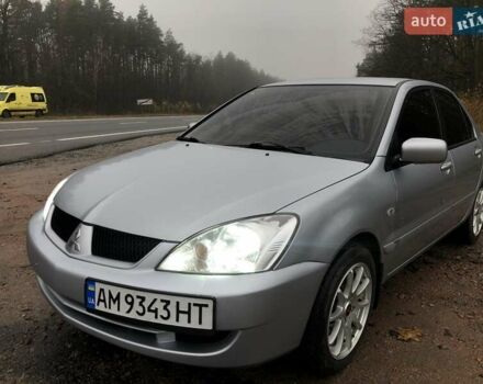 Серый Мицубиси Лансер, объемом двигателя 1.58 л и пробегом 268 тыс. км за 3450 $, фото 11 на Automoto.ua