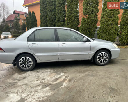 Сірий Міцубісі Lancer, об'ємом двигуна 1.58 л та пробігом 220 тис. км за 5900 $, фото 5 на Automoto.ua