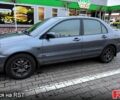 Серый Мицубиси Лансер, объемом двигателя 1.6 л и пробегом 289 тыс. км за 5600 $, фото 2 на Automoto.ua