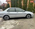 Сірий Міцубісі Lancer, об'ємом двигуна 1.58 л та пробігом 220 тис. км за 5900 $, фото 5 на Automoto.ua