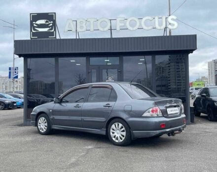 Серый Мицубиси Лансер, объемом двигателя 1.6 л и пробегом 146 тыс. км за 5990 $, фото 4 на Automoto.ua