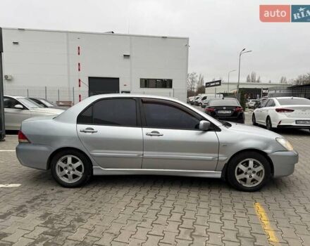 Сірий Міцубісі Lancer, об'ємом двигуна 1.6 л та пробігом 206 тис. км за 4799 $, фото 8 на Automoto.ua