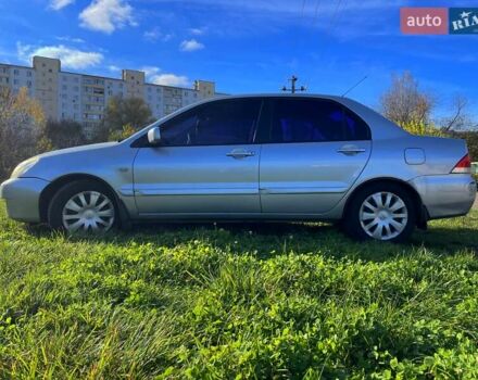 Сірий Міцубісі Lancer, об'ємом двигуна 1.6 л та пробігом 364 тис. км за 4300 $, фото 3 на Automoto.ua
