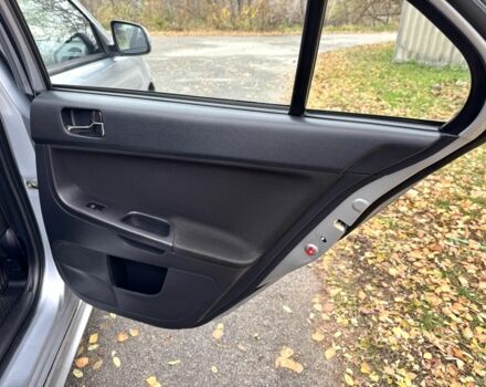 Серый Мицубиси Лансер, объемом двигателя 2 л и пробегом 225 тыс. км за 6890 $, фото 14 на Automoto.ua