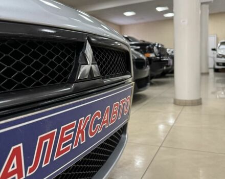 Серый Мицубиси Лансер, объемом двигателя 2 л и пробегом 172 тыс. км за 6300 $, фото 1 на Automoto.ua