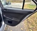 Серый Мицубиси Лансер, объемом двигателя 2 л и пробегом 225 тыс. км за 6890 $, фото 14 на Automoto.ua