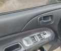 Сірий Міцубісі Lancer, об'ємом двигуна 1.58 л та пробігом 1 тис. км за 2850 $, фото 12 на Automoto.ua