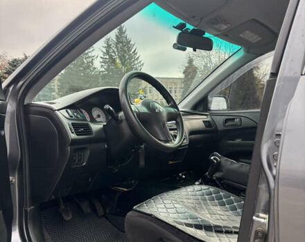 Серый Мицубиси Лансер, объемом двигателя 1.6 л и пробегом 222 тыс. км за 5200 $, фото 12 на Automoto.ua