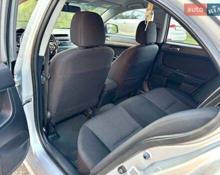 Сірий Міцубісі Lancer, об'ємом двигуна 2 л та пробігом 223 тис. км за 7390 $, фото 13 на Automoto.ua