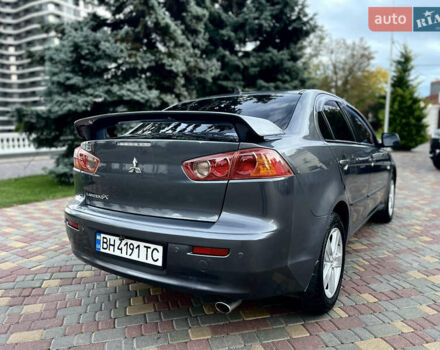 Серый Мицубиси Лансер, объемом двигателя 2 л и пробегом 212 тыс. км за 6000 $, фото 10 на Automoto.ua