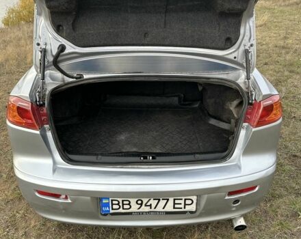 Серый Мицубиси Лансер, объемом двигателя 1.5 л и пробегом 321 тыс. км за 3900 $, фото 6 на Automoto.ua