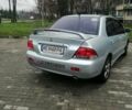 Сірий Міцубісі Lancer, об'ємом двигуна 1.6 л та пробігом 225 тис. км за 5200 $, фото 2 на Automoto.ua