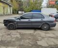 Сірий Міцубісі Lancer, об'ємом двигуна 1.58 л та пробігом 200 тис. км за 1700 $, фото 5 на Automoto.ua