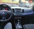 Серый Мицубиси Лансер, объемом двигателя 2 л и пробегом 225 тыс. км за 8200 $, фото 12 на Automoto.ua
