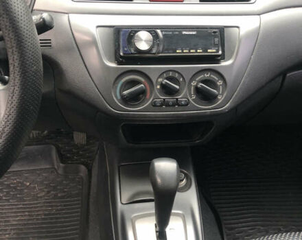 Сірий Міцубісі Lancer, об'ємом двигуна 1.58 л та пробігом 240 тис. км за 4299 $, фото 17 на Automoto.ua